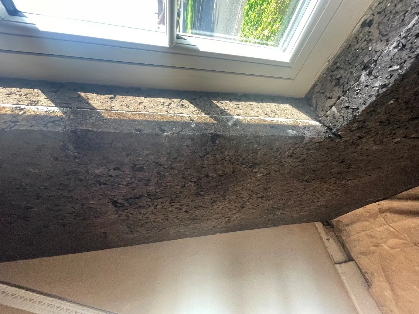 Real photo from one of my jobs: a bay window lined with cork insulation, before plastering.