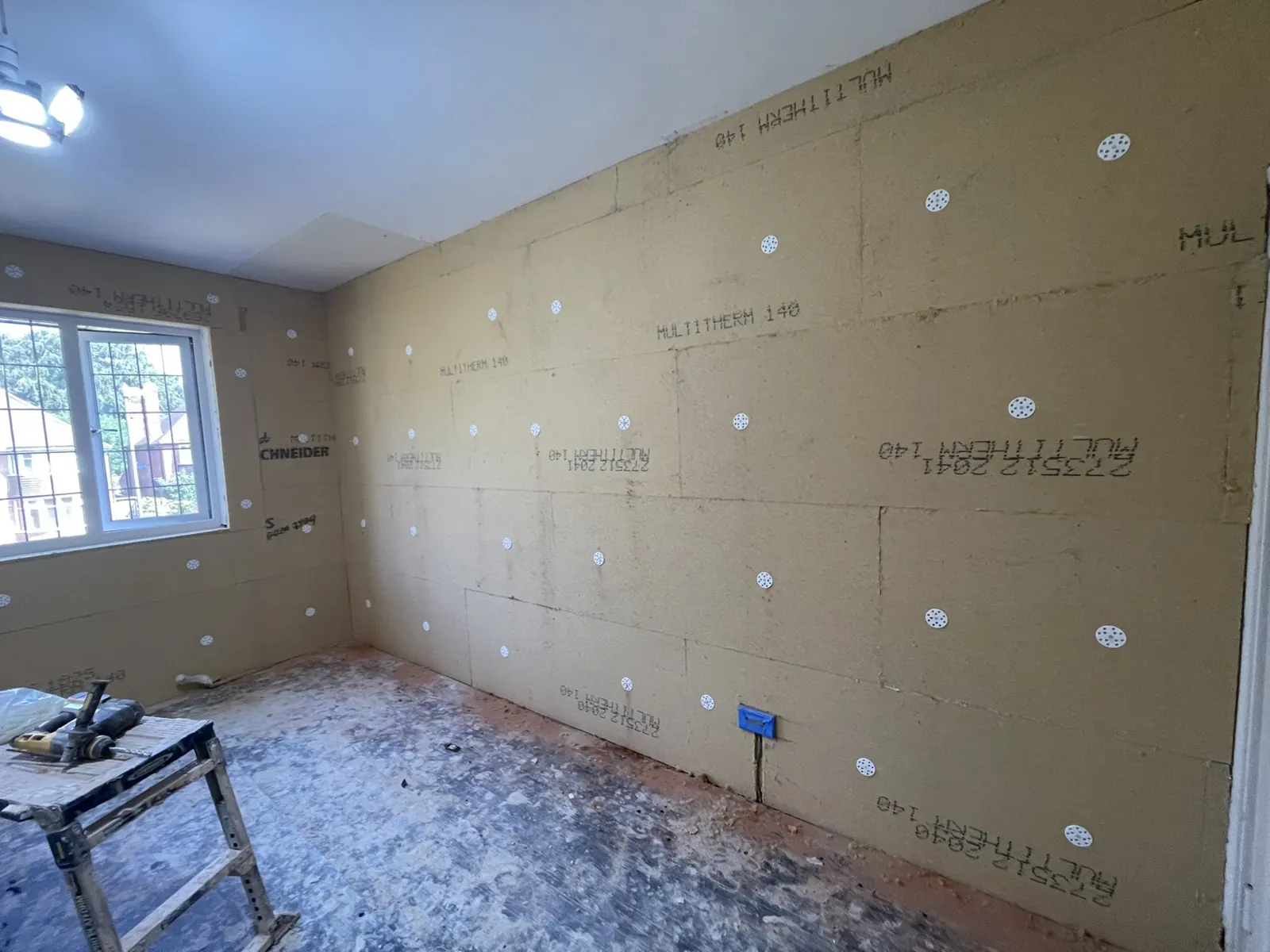 Real photo from one of my jobs: breathable wood fibre boards, a vapour-open system, fixed to a solid wall.