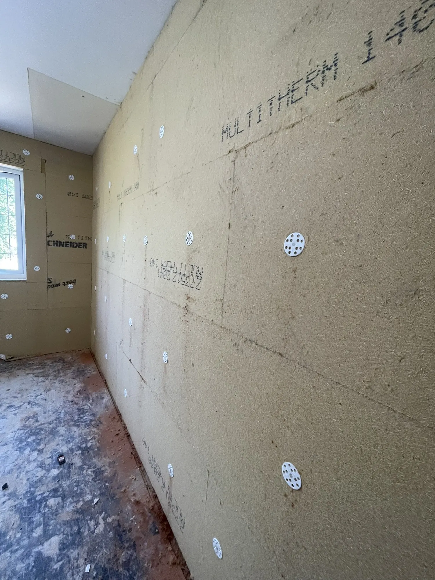 Thermal plasterboard, wood fibre or PIR: which suits a solid wall?
