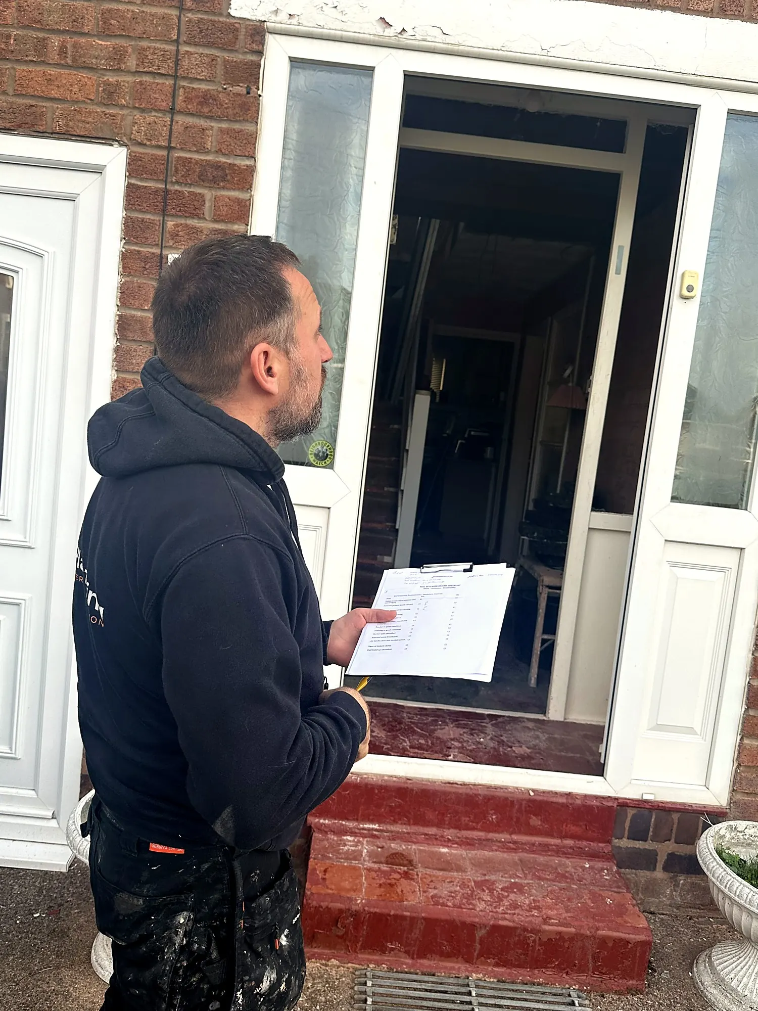 Wojtek arriving for a free home visit with his survey notes