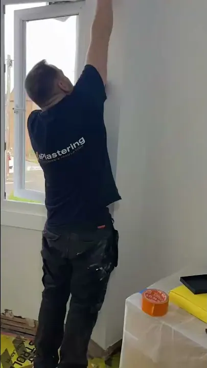 Wojtek on a real insulation job in a customer bedroom